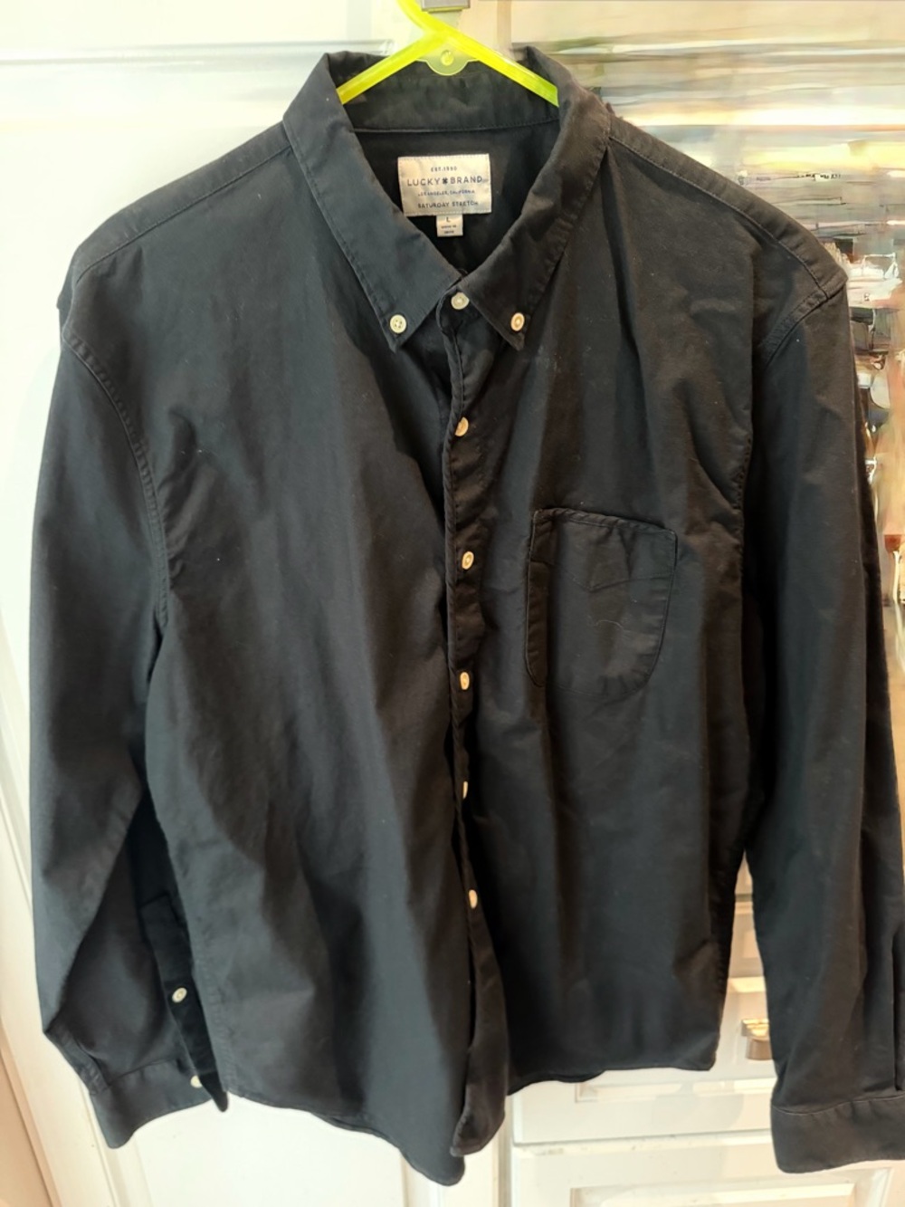 Lucky Brand White Label on Black Fabric